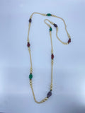 Long pearl beaded necklace with multi color textured beads