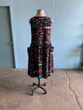 Awesome 90's Black drop waist jumper dress with multi color southwestern print