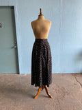 90's Black button down maxi skirt with a white polka dot & bow print