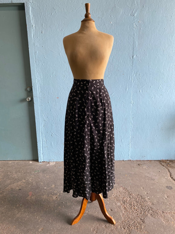 90's Black button down maxi skirt with a white polka dot & bow print