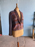 90's cropped jacket in a blocked patchwork Moroccan floral print.
