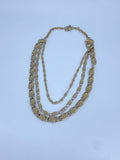 80-90's Heavy gold tone 3 chain layered necklace.