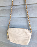 Ivory Quilted leather purse w/gold chain strap.䁣 䁣