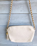 Ivory Quilted leather purse w/gold chain strap.䁣 䁣