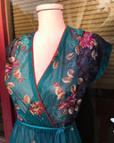 1970äó»s Sheer Teal floral dress w/an elastic waistband with a string belt. 䁣