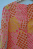 1960/1970's Orange & Pink polka dot min mod dress with sheer long sleeves