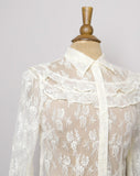 Y2K Express Ivory laced button down long sleeve blouse with a ruffle bib and bell handkerchief sleeves.
