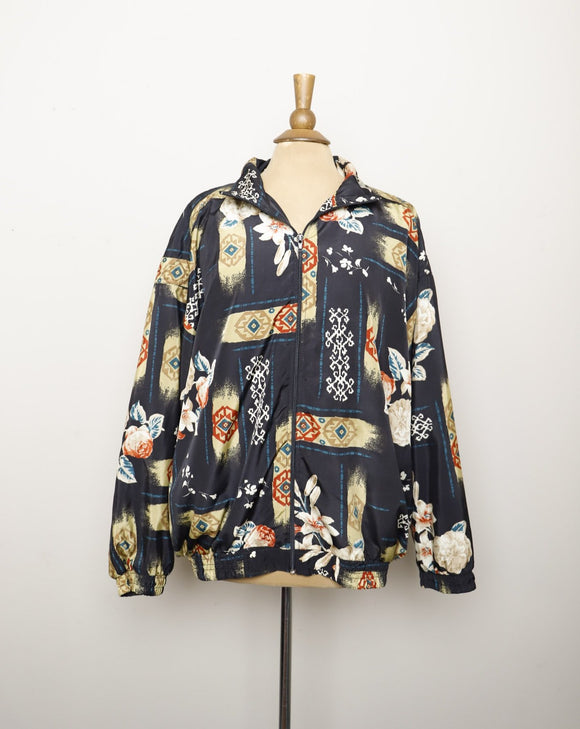 1990's Black Nylon bomber jacket with a floral and southwestern print