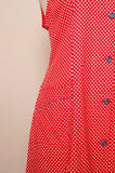 1970's Red & white polka dot sleeveless mod dress with navy trim & buttons with pockets