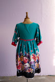 1990's Teal green floral house dress with adjustable side ties.