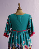 1990's Teal green floral house dress with adjustable side ties.