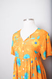 1990's Orange button-down short sleeve plus size dress with yellow & turquoise daisy print