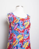 1990's Red sleeveless Plus size romper with a turquoise,yellow & violet tropical floral print