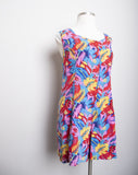 1990's Red sleeveless Plus size romper with a turquoise,yellow & violet tropical floral print