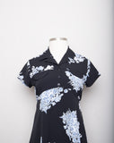 1990's Black Baby doll short sleeve mini dress with a sky blue grey floral bouquet print
