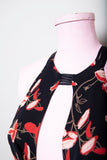 Y2K Bebe Black Strappy Halter dress with a plunging neckline in a red lilly floral print
