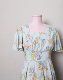 1970's Baby blue Boho flutter sleeve mini dress with blue and golden florals