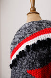 1990's Black, White & Red knitted pull over sweater with pom pom embellishments