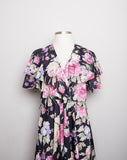 1980-90's Black Plus size short sleeve dress with a pink and purple floral print