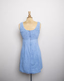 1990's Denim baby doll sleeveless mini dress with a smock bodice and daisy appliques