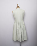 1950-60's Tan sleeveless button down dress with gold buttons