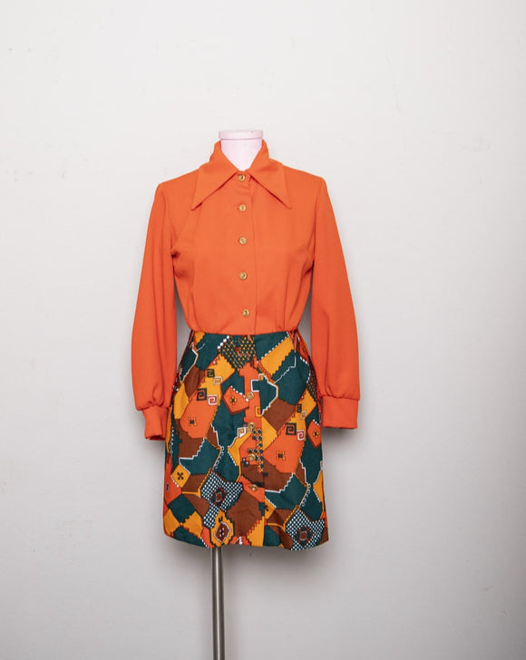1970's  Orange polyester long sleeve psychedelic mini dress