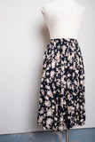 1990's Black skirt with a ivory and brown floral print.