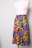 1990's Black A-line skirt with a abstract floral print