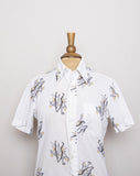 1970's White short sleeve button down shirt with a novelty print of dancing tuxedo guys