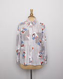 1970's White long sleeve shirt with a orange & blue striped novelty print of 2 flapper girls