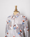 1970's White long sleeve shirt with a orange & blue striped novelty print of 2 flapper girls