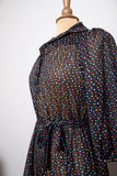 1970's Black sheer puff sleeve dress with rainbow polka dots.