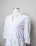 1970-80's sheer White 3/4 puff sleeve dress with navy blue polka dot print & accordian pleated skirt