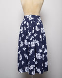 1980-90's Navy blue pleated skirt with white floral and fruit print