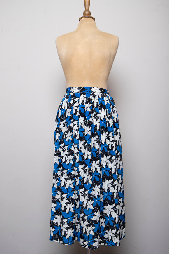 1990's Black, Blue and White pleated skirt with a floral and polka dot print