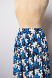 1990's Black, Blue and White pleated skirt with a floral and polka dot print