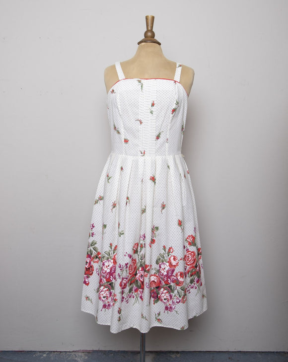 1970's Ivory sleeveless dress with black polka dots and red florals