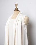 Ivory sheer sleeveless silk maxi dress with an attached duster vest