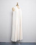 Ivory sheer sleeveless silk maxi dress with an attached duster vest