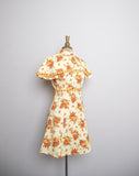 1970's Yellow floral mini dress with attached layered capelet