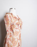 Y2K Ivory bias silk dress with bell sleeves in a orange & red floral & paisley print