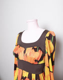 1970's Brown maxi long sleeve dress in a orange tulip print