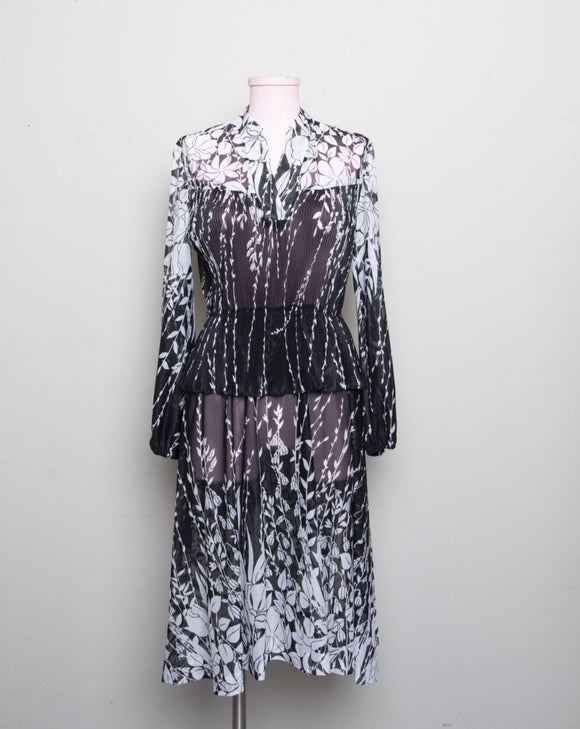1970’s Black & White sheer floral long sleeve Dress with peplum skirt