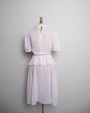 1970's Pink sheer polka dot prairie dress with puff sleeves, peplum skirt and laced highneck