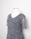 Y2K Black & White Plus size short sleeve silk bias dress in a circular abstract print with a ruffle asymmetrical hem