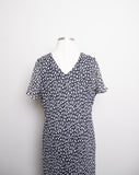 Y2K Black & White Plus size short sleeve silk bias dress in a circular abstract print with a ruffle asymmetrical hem