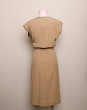 1970's Sleeveless Tan A-line dress with a faux wrap bodice and black trim detail