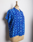 1990's Blue short sleeve button down shirt with abstract swirl sunflower print