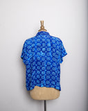 1990's Blue short sleeve button down shirt with abstract swirl sunflower print