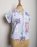 1980-90's Sky Blue short sleeve button down shirt with a floral red, blue and white quilt patchwork print
